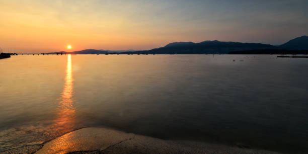 istock Beautiful sunset in kitasilano beach Vancouver Canada 1058618566