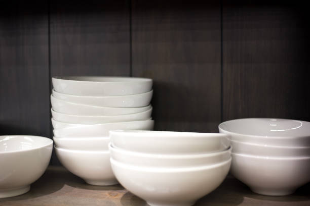 istock Stacks of White Bowls; Black Background; Copy Space 1058632844