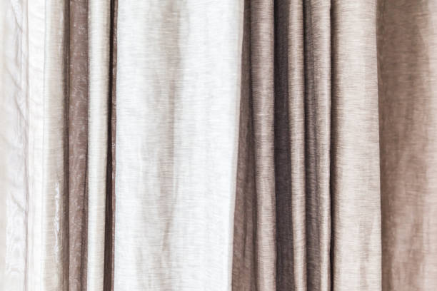 istock gray curtains at the windows 1058637316