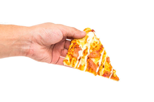 istock Slice of Pizza with hand isolated 1058638680