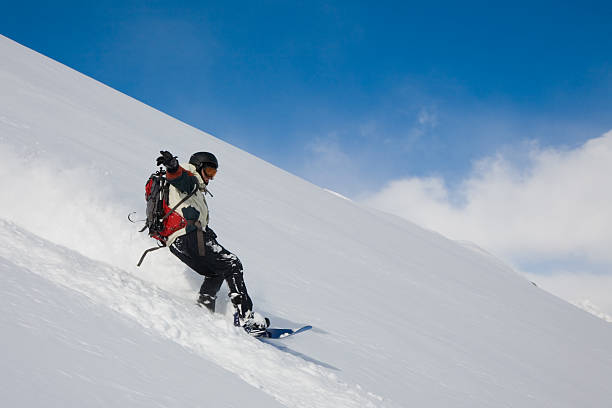 istock Snowboarding in powder snow 105864105