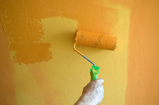 istock Painting Yellow Wall in Orange 105864111
