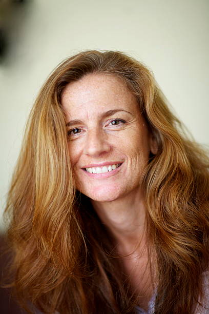 istock Striking Looking Red Haired Woman with Nice Smile 105864528