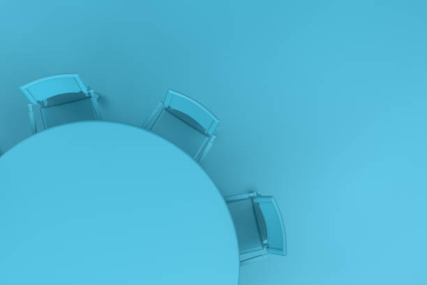 istock Meeting table with chairs, minimal concept. 1058654742