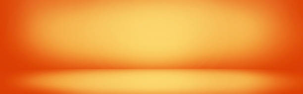 istock yellow and orange gradient wall banner, blank studio room background for present product 1058654876