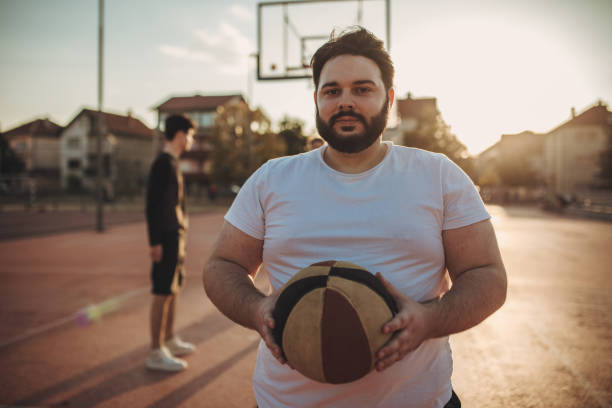 istock Chubby streetball player 1058658388