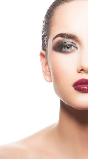 istock Young model girl part of face with bright makeup 1058660100