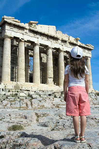 istock Child in front of Ancient Parthenon Acropolis Athens Greece. 105866506