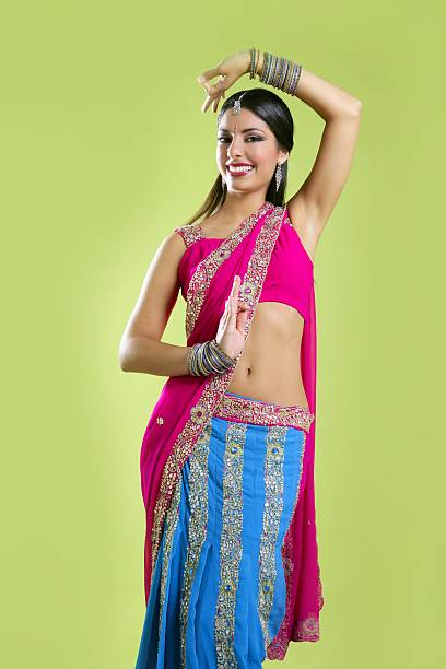 istock Beautiful indian young brunette woman dancing 105867814