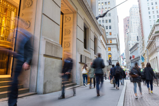 istock Business People Walking Blurred Motion 1058681702