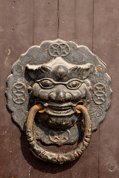 istock chinese door with a lion head. 105868208