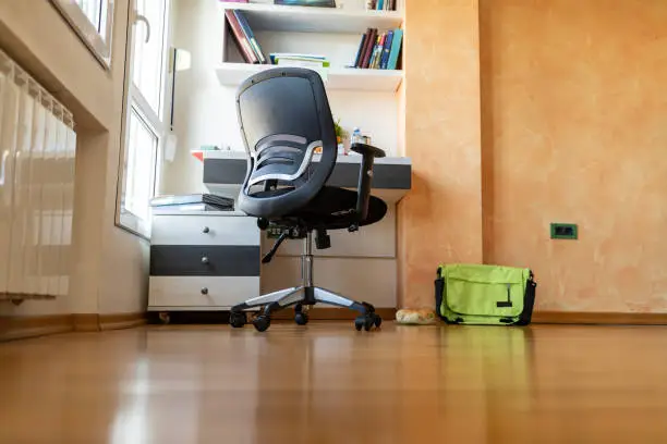 Photo of Black office chair at studying desk