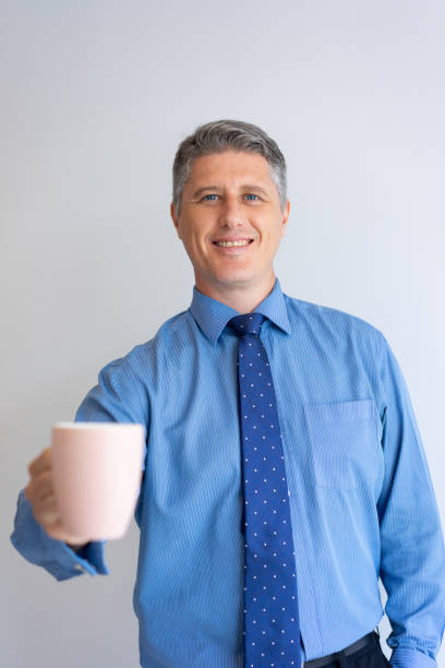 istock Happy business professional enjoying office morning 1058684044