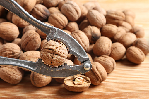 walnut and nut peeling tools on the table