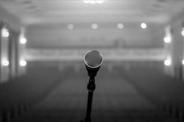 istock A microphone on stage in a concert hall or american bar (restaurant) during a show. 1058687772