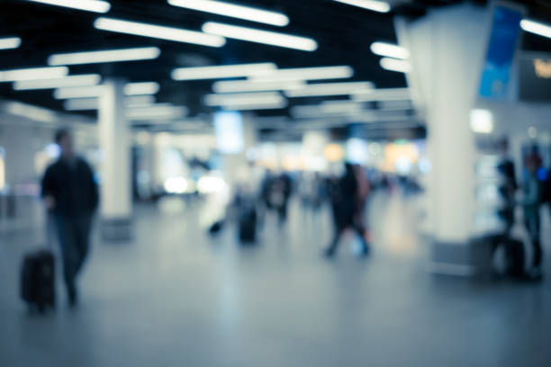 istock Blurred passenger in airport terminal. 1058692450
