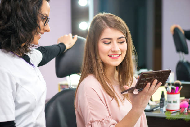 istock young woman at salon for a make up 1058694656