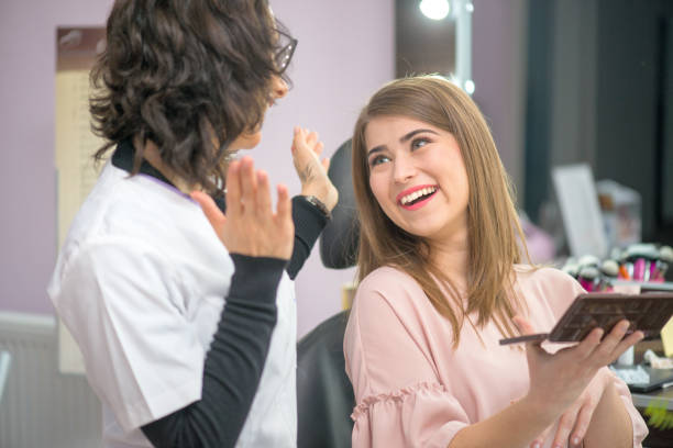 istock young woman at salon for a make up 1058696620