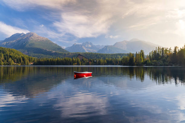 istock Peaceful mountain scene with mountain lake. 1058697318