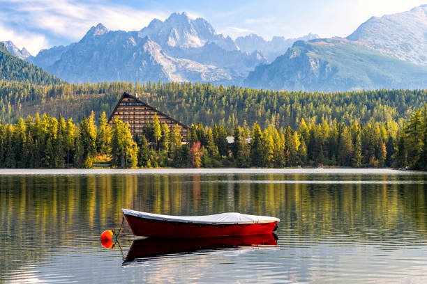 istock Peaceful mountain scene with mountain lake. 1058697356