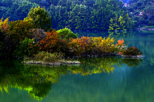 VH533 is a autumnal landscape of the lake that appears to have a autumn light in the blue waters of Hapcheon Lake