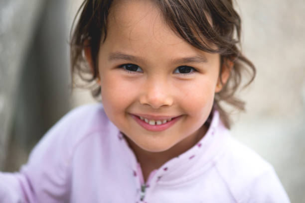 istock Little girl smilling at camera 1058697380
