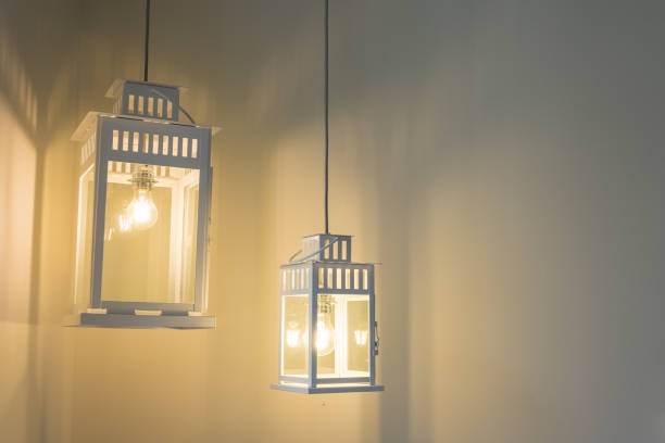 istock Modern home interior: white wall and white vintage style lamp 1058701322