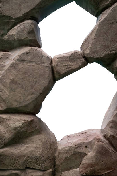 istock Background wall made of stone with white copy space including path selection. 1058701670