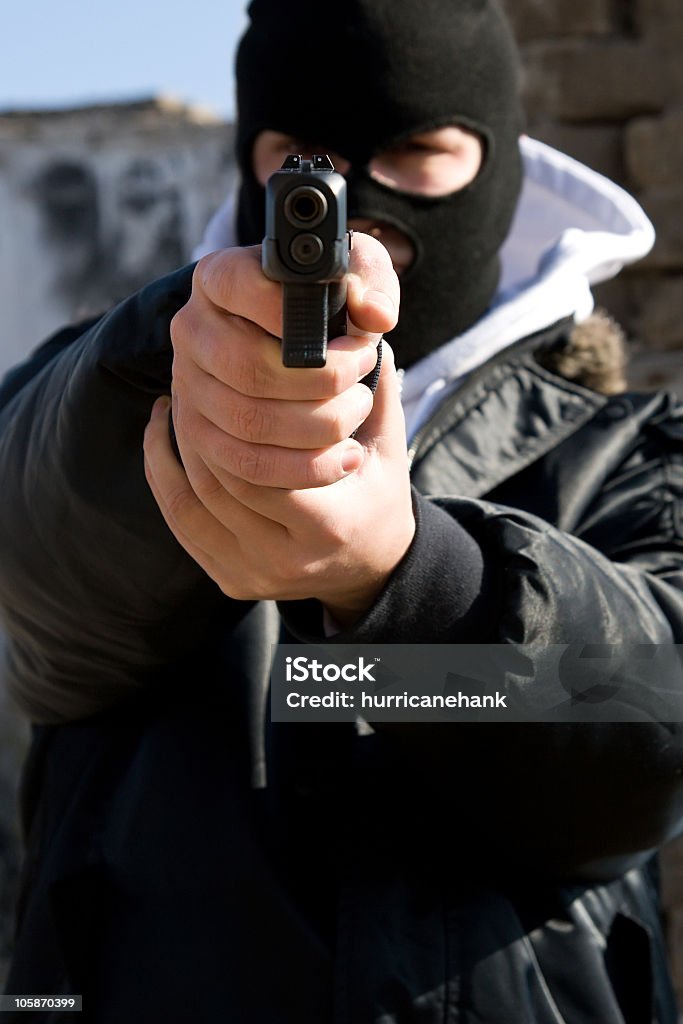 Obiettivo è Criminale armato - Foto stock royalty-free di Adulto