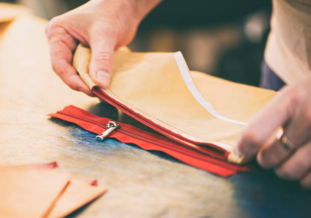 istock Woman working on a handmade bag 1058704772