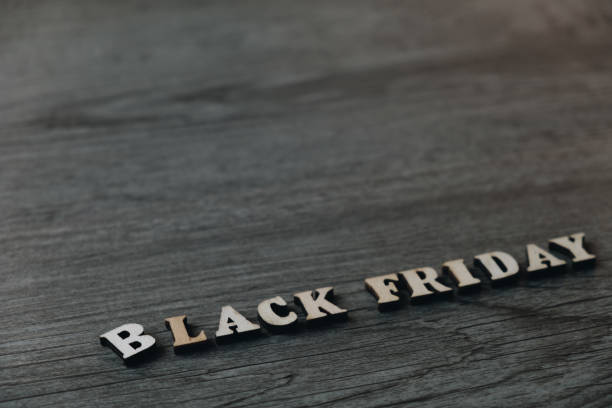 istock Black Friday background ,crossword puzzle black friday text on a wooden background, copy space for text. 1058707640
