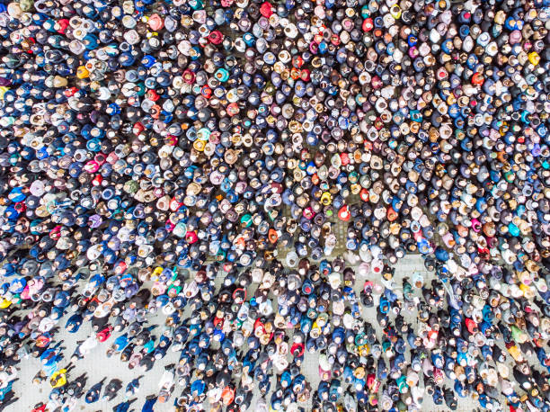 istock above view on crowd. big amount of people. 1058709228