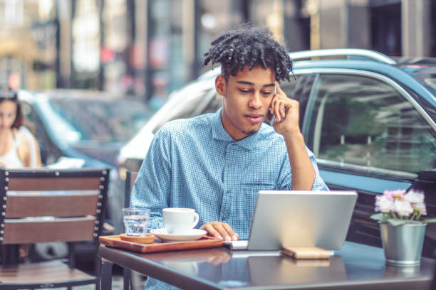 istock Young influencer is blogging from a sidewalk caffee 1058709538