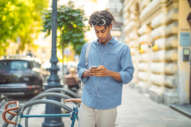 istock Young man is listening music on the move 1058711020
