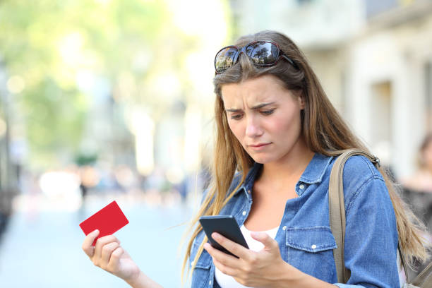 istock Worried girl having payment problems 1058712654