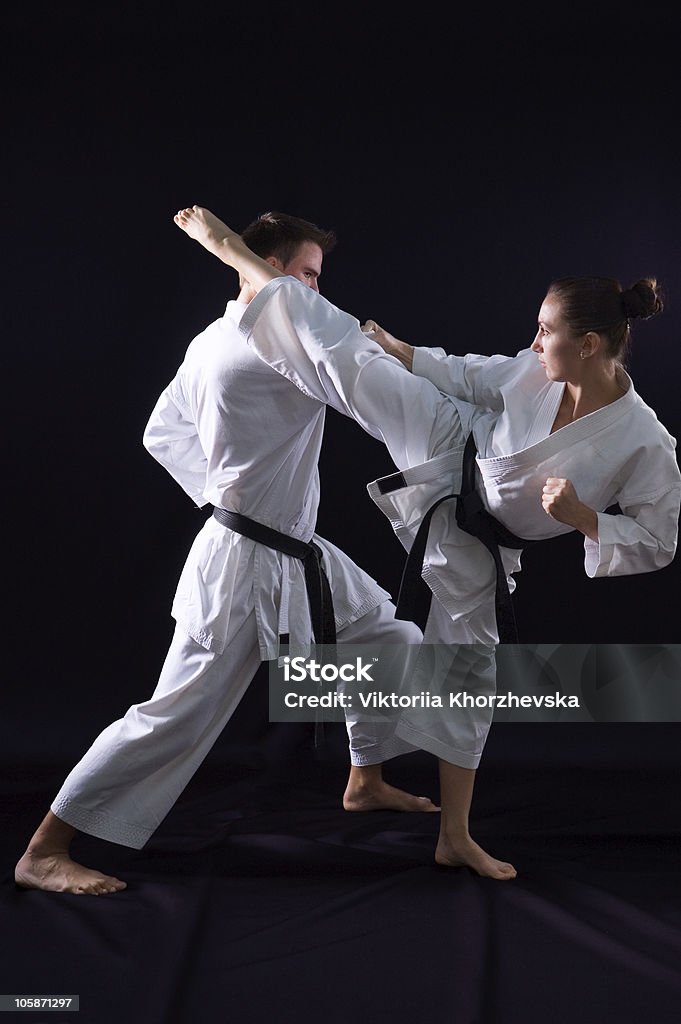 Lucha de karate pareja - Foto de stock de Kárate libre de derechos