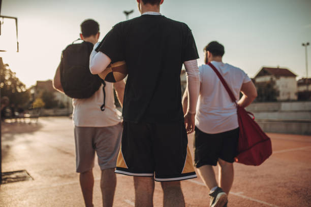 istock Friends going to play streetbal 1058715094