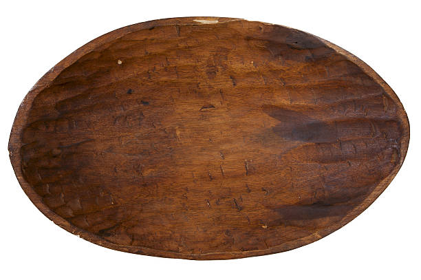 istock old handmade carved wooden bowl, isolated on white 105871592