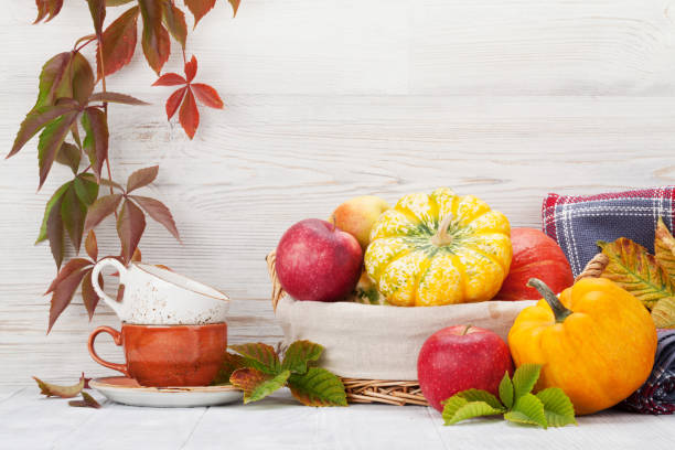 istock Autumn still life with pumpkins and fruits 1058716470