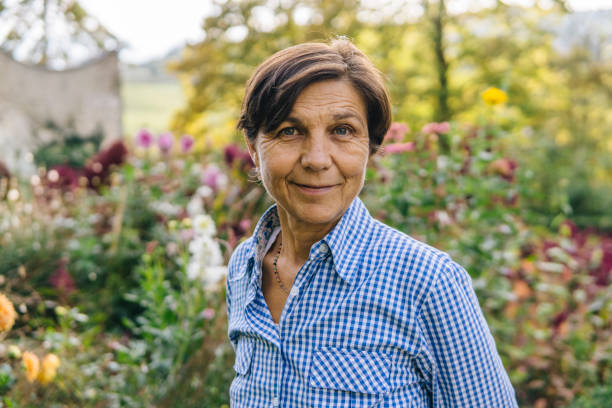 istock Senior woman gardening 1058719198