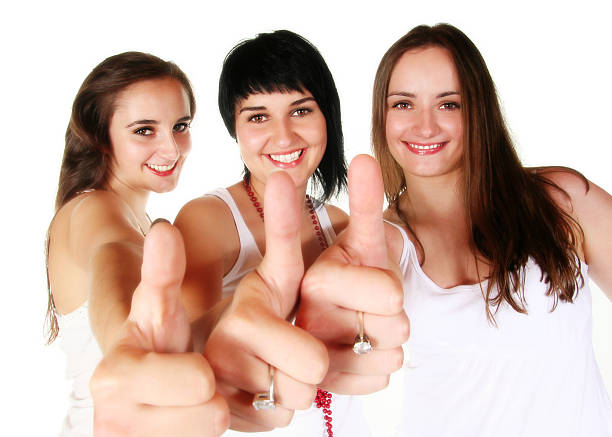 istock Three beautiful girls with thumbs up 105872176