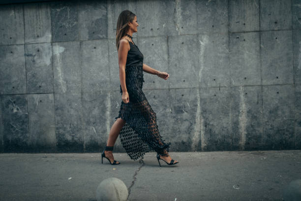 istock Pretty Young Woman Walking 1058722694