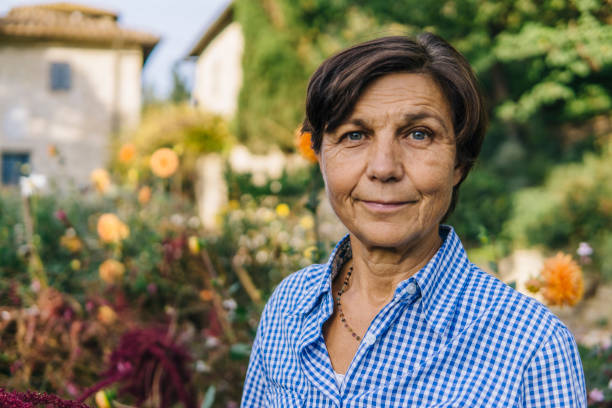 istock Senior woman gardening 1058724554