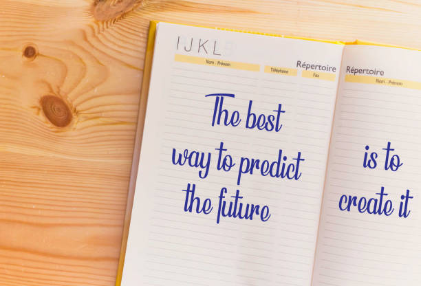 istock open notebook over wooden table with motivational saying 1058725860