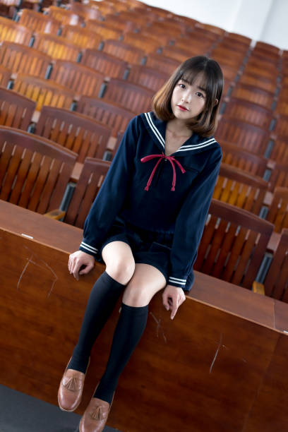 istock Asian girl student in school uniform 1058727920