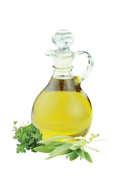 istock Isolated Olive Oil and Herbs 105872837