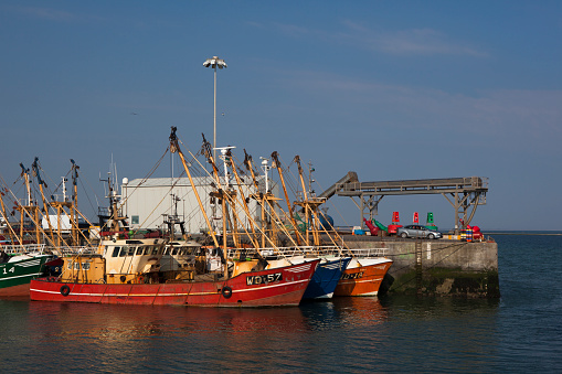 Ancient fishing boat moored in the port