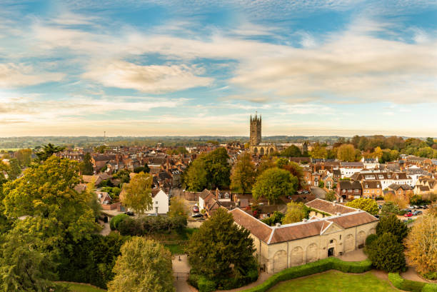 View over the town of Warwick with church Aerial View over the town of Warwick with church warwick uk stock pictures, royalty-free photos & images