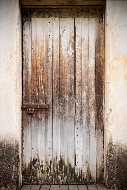 istock Old closed wooden door 105874125