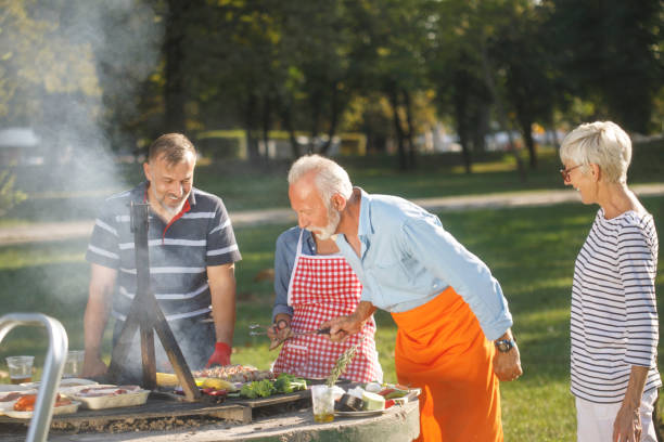 istock Senior people having a picnic 1058741402